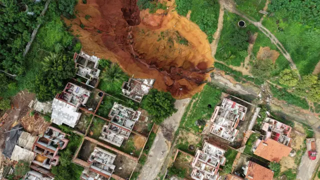 A drone view shows the town of Buriticupu, a small Amazonian town that was declared in a state of public calamity due to sinkholes that threaten the community, in Buriticupu, state of Maranhao, Brazil February 20, 2025. REUTERS/Mauricio Marinho