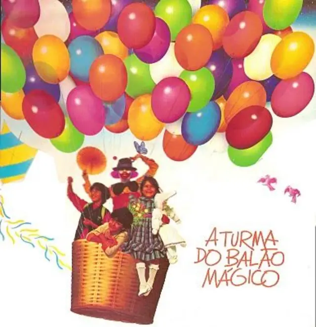 Capa de disco mostra crianças em grande balão desenhado, com palhaço no meio delas