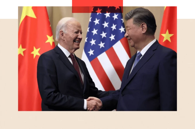 Former US President Joe Biden shaking hands with China's President Xi Jinping