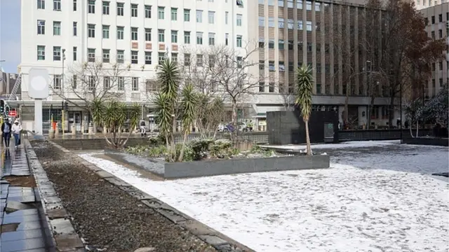 General view of snow for one plaza for front of one office building for Johannesburg on July 10, 2023.