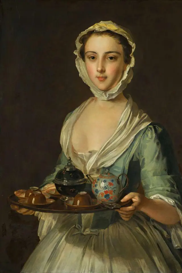 A young woman holding a tea tray (possibly Hannah, the artist's maid). Private Collection. Artist Mercier, Philippe (1689-1760). (Photo by Fine Art Images/Heritage Images via Getty Images)
