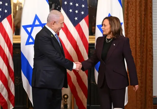 Kamala Harris shakes hands with Israeli Prime Minister Benjamin Netanyahu 