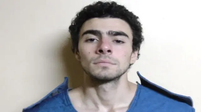 پلیس این عکس را از آقای منجیونه پس از متهم شدن به قتل منتشر کرد