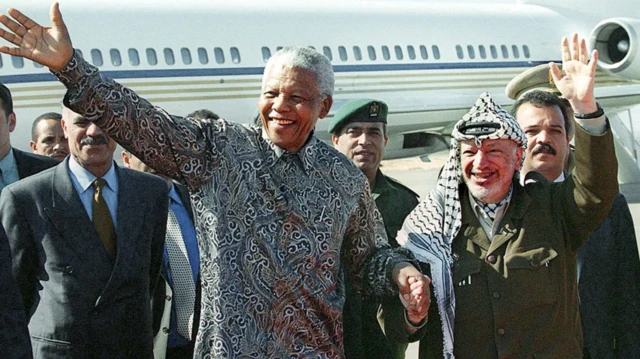 نيلسون وعرفات 