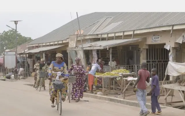 Woman on top bicycle for market