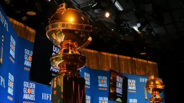 Two Globe statues on stageImage