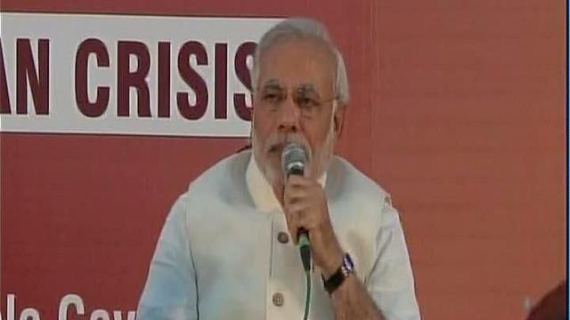 किसानों के साथ चाय पर चर्चा कार्यक्रम को संबोधित करते नरेंद्र मोदी