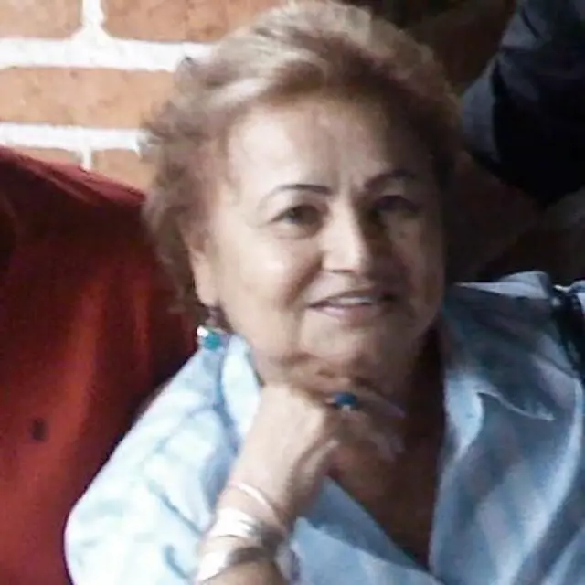 Griselda était connue comme la Marraine, on dit qu'elle est arrivée avec des valises de cadeaux pour les habitants du quartier où elle a grandi.