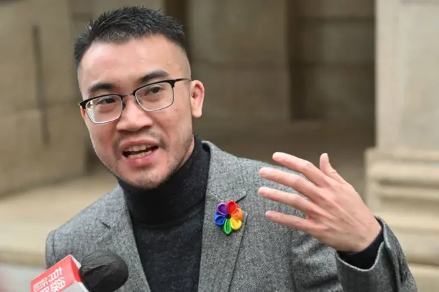 Transgender activist Henry Tse speaks to the media outside the Court of Final Appeal in Hong Kong on February 6, 2023. 