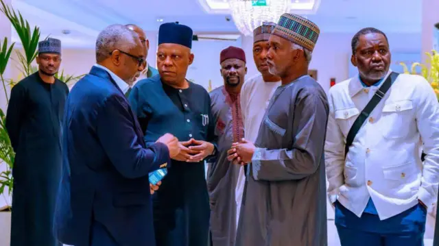 Nigeria Chief of Staff dress in suit wit Vice president Shettima wit oda men wey dey stand