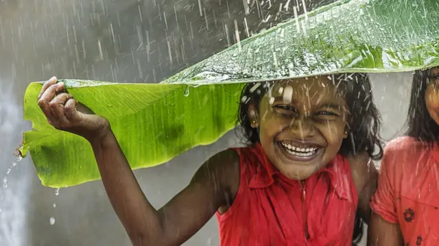 Rain girls smiling