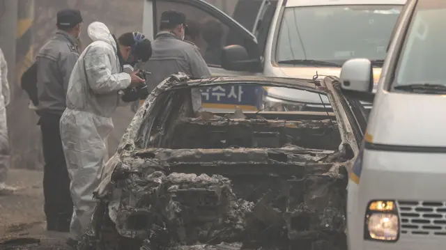 Forenzičar vrši uviđaj posle požara