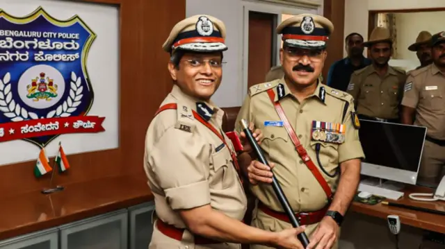 Bengalure policemen stand inside dia office