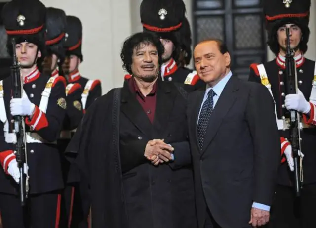 late Libya president Gaddafi and Berlusconi