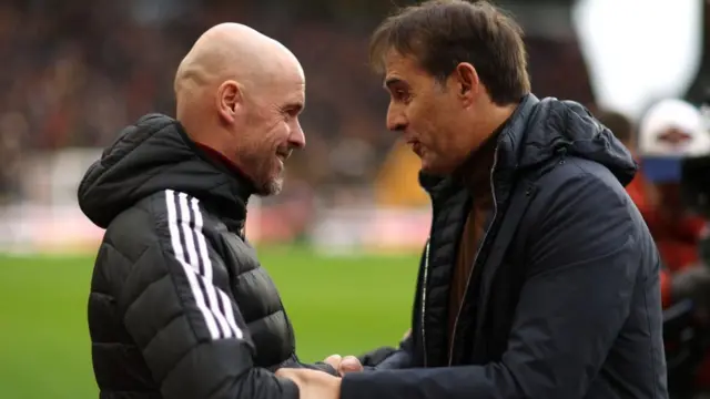 Manchester United manager Erik ten Hag shakes hands with Wolves head coach Julen Lopetegui