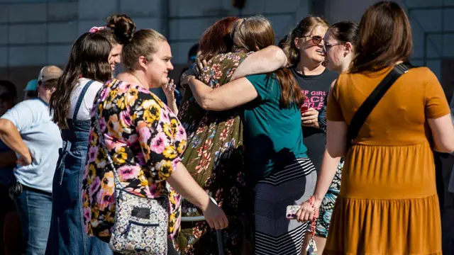 ঘটনার পর চার্চ সদস্য ও স্থানীয়দের দেখা যাচ্ছে