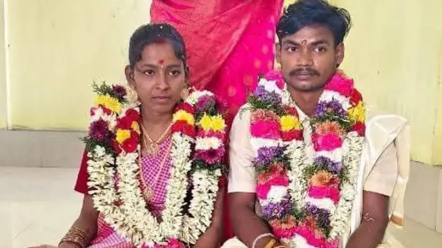 திருமணக் கோலத்தில் தம்பதி 