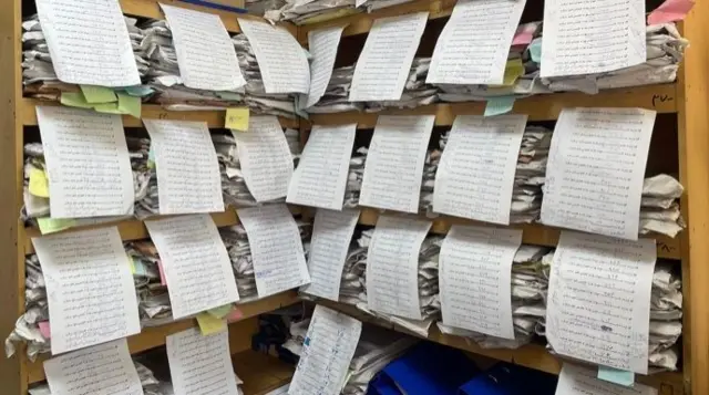 Shelf with documents 