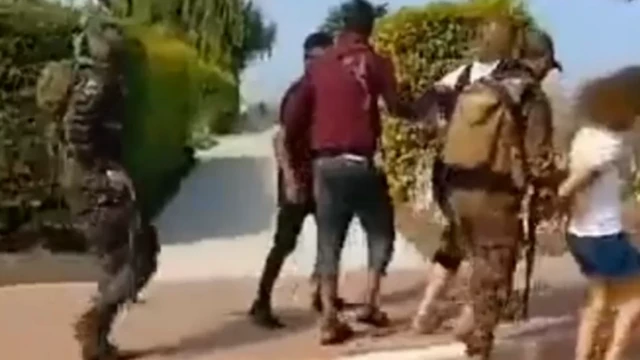 Hamas fighters taking hostages