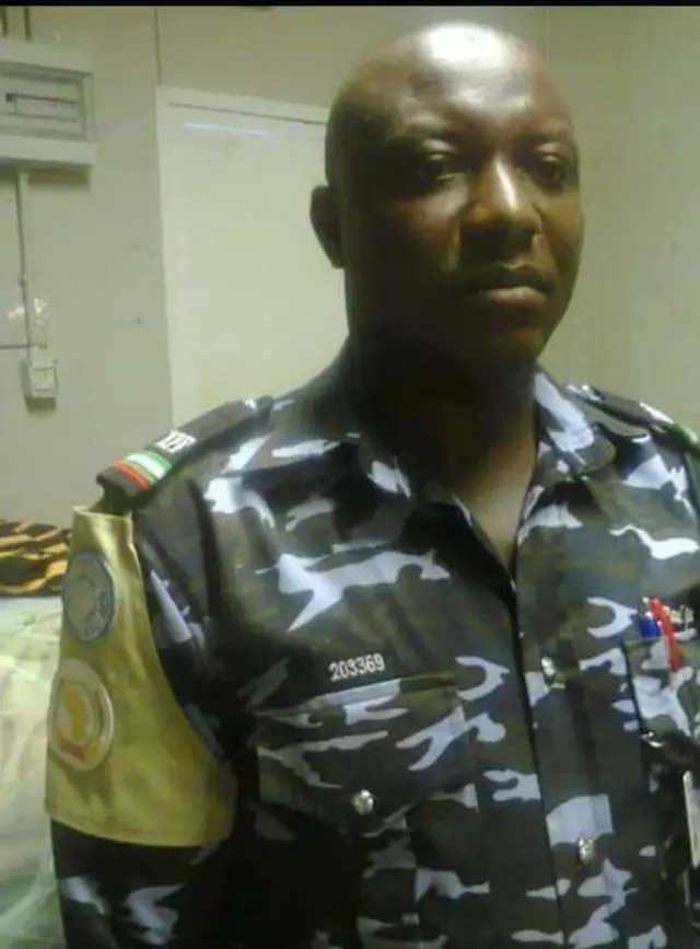 Inspector Paul Ugwu wear police uniform