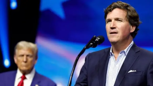 Сүрөттө: 2003-жылы Такер Карлсон Ирактагы согушту колдочу, эми болсо, бул үчүн өкүнөт