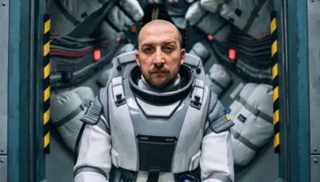 Людина у скафандрі, Кадр з фільму "Ти-космос"