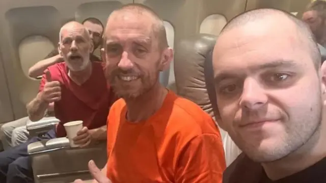 John Harding, Shaun Pinner and Aiden Aslin (pictured left to right) were among the five prisoners of war released.