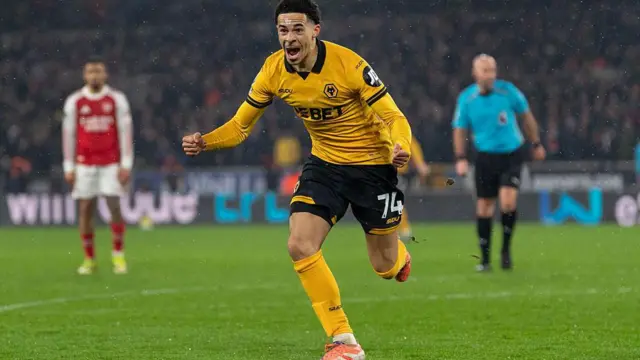 Tom celebrating im goal against Arsenal