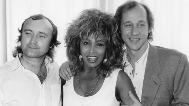 Tina Turner akiwa na Phil Collins (kushoto) na Mark Knopfler, aliyeandika Private Dancer