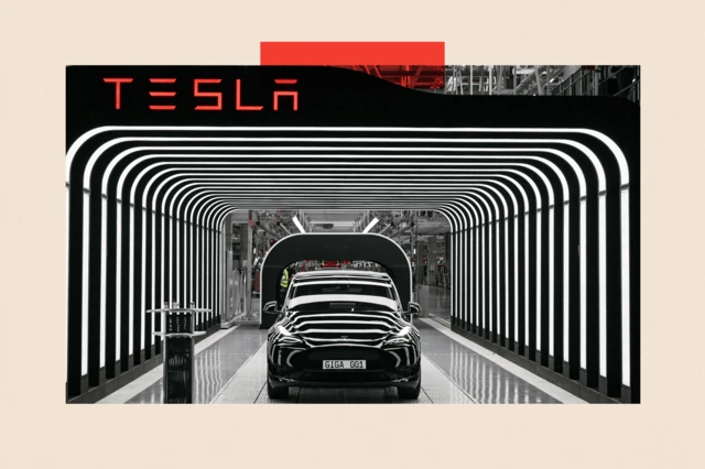 Tesla logo and car surrounded by lights