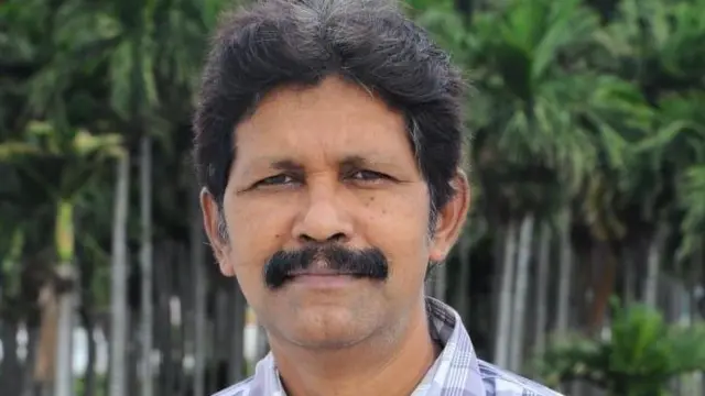 .பாலமுருகன்.