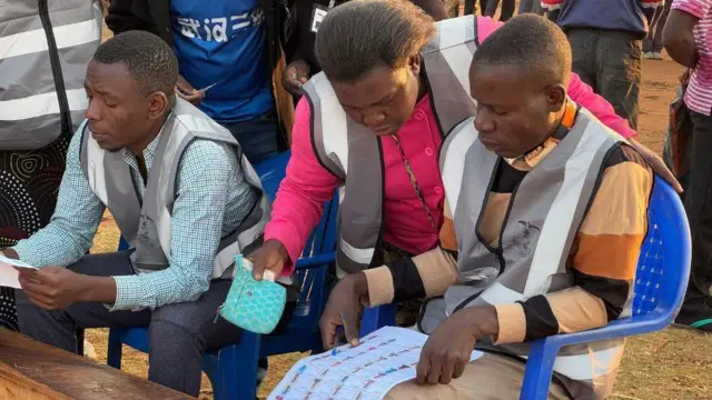 Malawi Electoral Commission officials