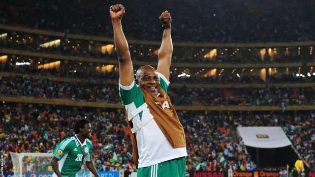 Nigeria coach Stephen Keshi celebrate as dem beat Burkina Faso for di final of di 2013 Africa Cup of Nations