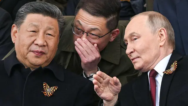 На параді Путін сидів пліч-о-пліч із Сі Цзіньпінем, який мав на своєму одязі георгіївську стрічку
