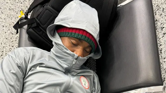 Super Eagles player sleep for airport chair