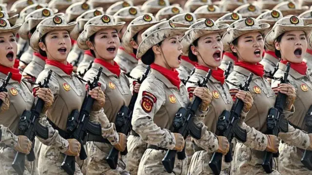 Women military carry weapon for parade
