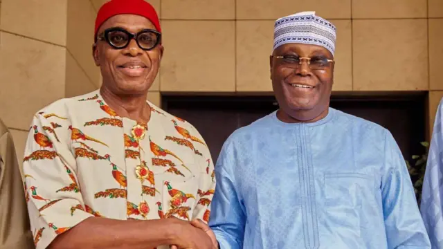 Atiku Abubakar and Amarchi shake hand