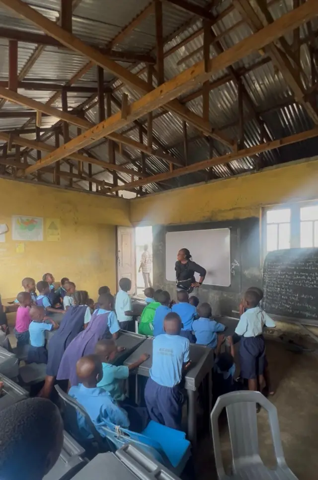 Pupils of Migrant Fishermen Children’s School Dic Fiberesima Ama, Okrika LGA of Rivers State with dia female teacher