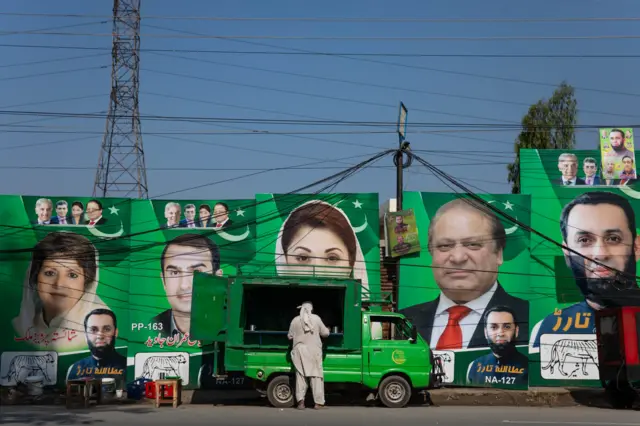 Campaign posters for Nawaz Sharif, Pakistan's former prime minister, along a street ahead of Pakistan's national election in Lahore, Pakistan