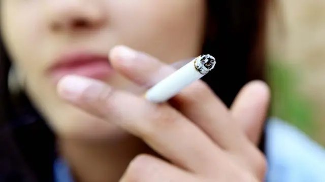 Woman smoking cigarette