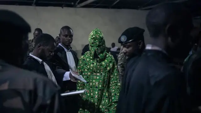 Marqaati wajiga soo duubtay oo ka baxaya maxkamad ku taal magaalada Goma ee dalka DR Cong