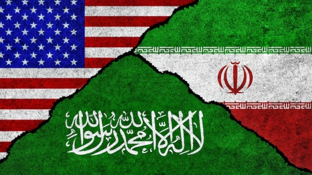 أعلام إيران والسعودية والولايات المتحدة.