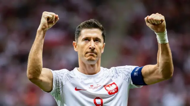 Robert Lewandowski celebrating a goal for Poland