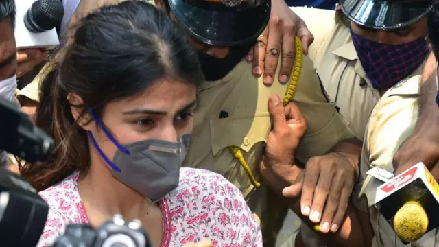 Bollywood actress Rhea Chakraborty (C) arrives at the Narcotics Control Bureau (NCB) office for enquiry regarding Sushant Singh Rajput case, in Mumbai on September 6, 2020.