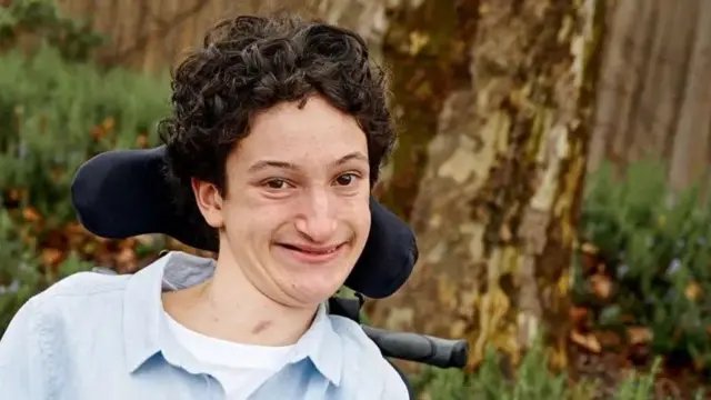 dečak iz australije, dečak u kolicima, kvadraplegičar, dečak sa invaliditetom