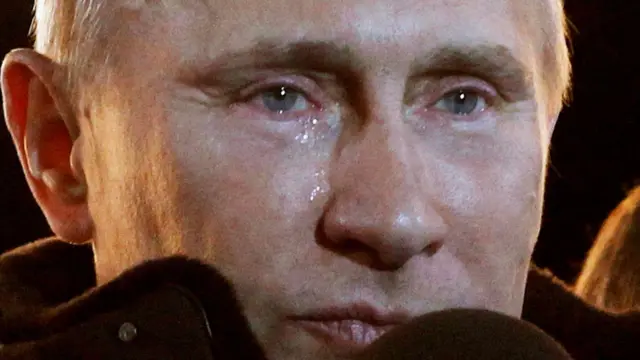 Um close do rosto de Putin chorando.