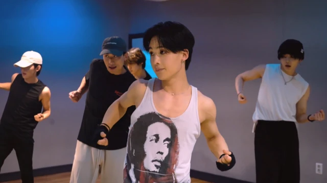 Hyuk and other members during a dance training session