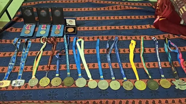 பளு தூக்குதலில் ராஜா முத்துப்பாண்டி வென்ற பதக்கங்கள்.