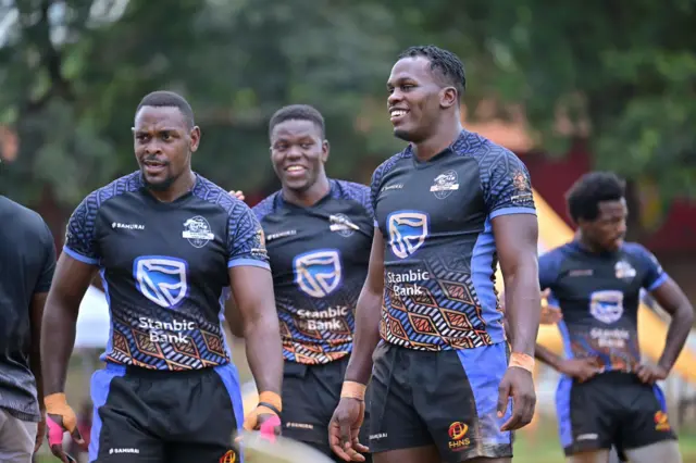 Sydney (imbere iburyo) yaranzwe n'ikinyabupfura, ubwitange no gukunda Rugby nk'uko byavuzwe n'ukuriye uyu mukino muri Uganda