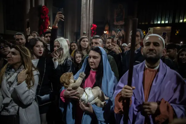 People attend Christmas Eve mass at the Saint Anthony of Padua Church on December 24, 2024 in Istanbul, Turkey